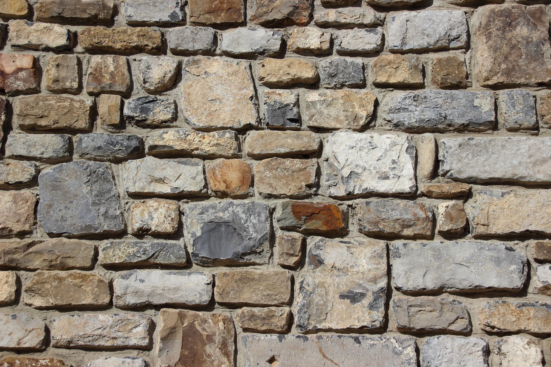 Texture d'un mur de soutènement en pierre sèche